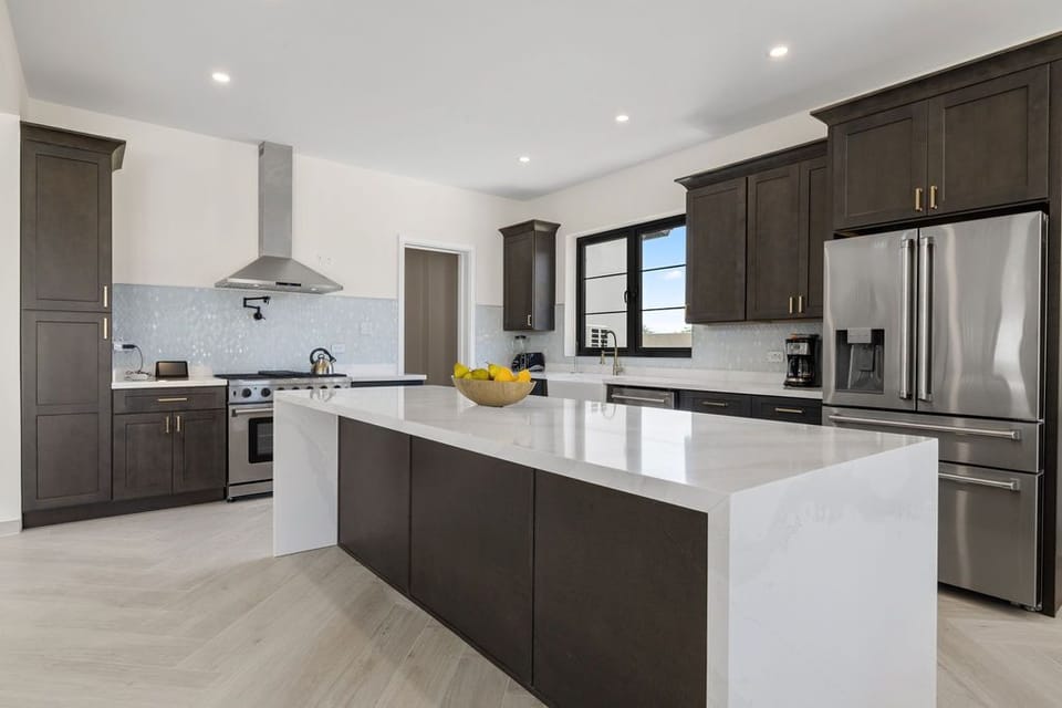 Create memorable meals in our thoughtfully crafted rental kitchen, designed for both beauty and functionality.