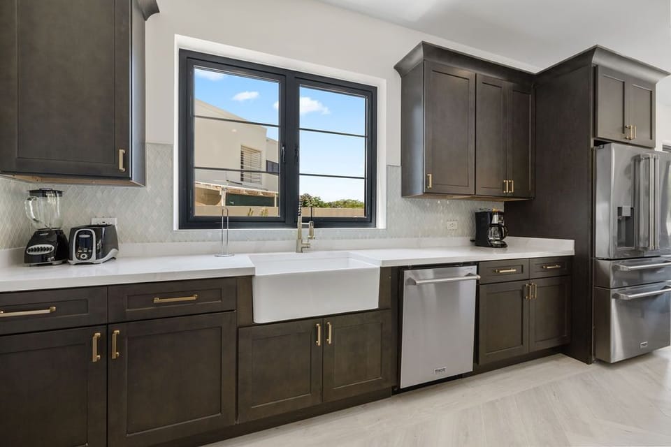 Create memorable meals in our thoughtfully crafted rental kitchen, designed for both beauty and functionality.