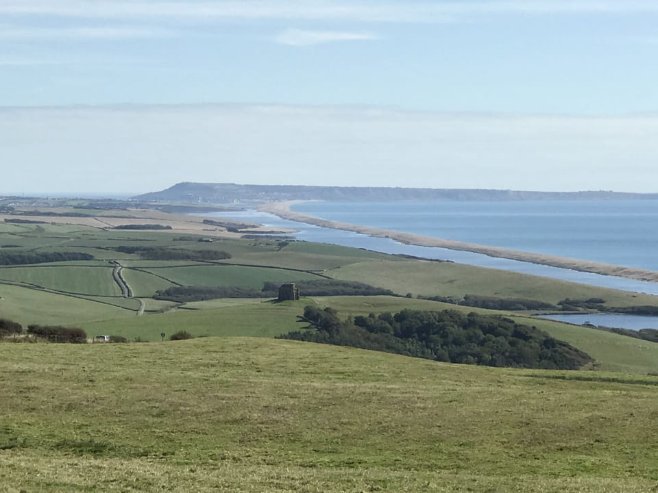 A view of the nearby Fleet, Chesil Beach and the Isle of Portland beyond