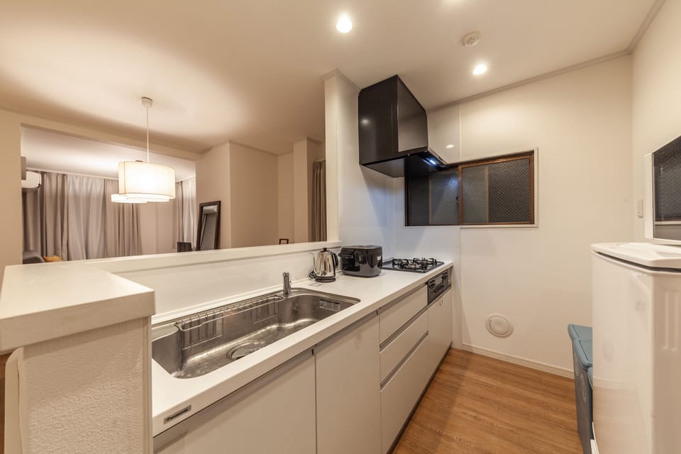 Apartment, Non Smoking | Private kitchen | Fridge, microwave, stovetop, electric kettle