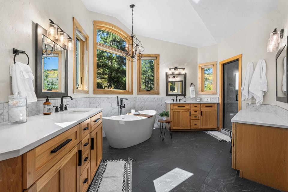 Custom luxury bathroom with steam shower and soaking tub 
