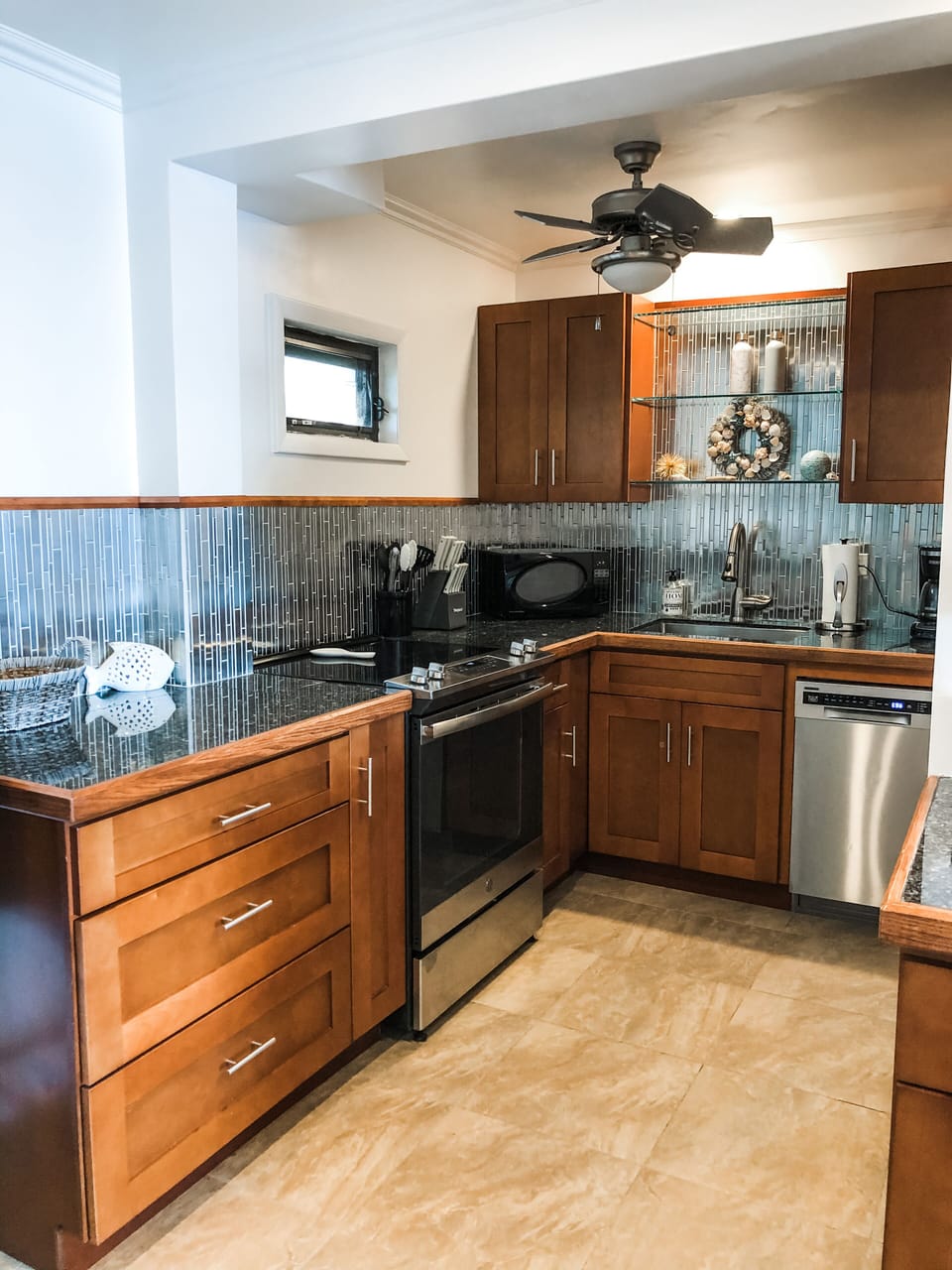 Kitchen with oven, full size refrigerator, dishwasher, microwave