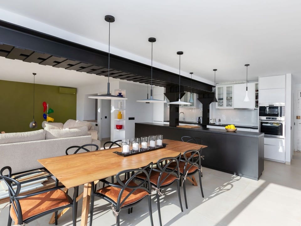 Furniture, Table, Cabinetry, Countertop, Building, Interior Design, Orange, Couch, Living Room, Kitchen