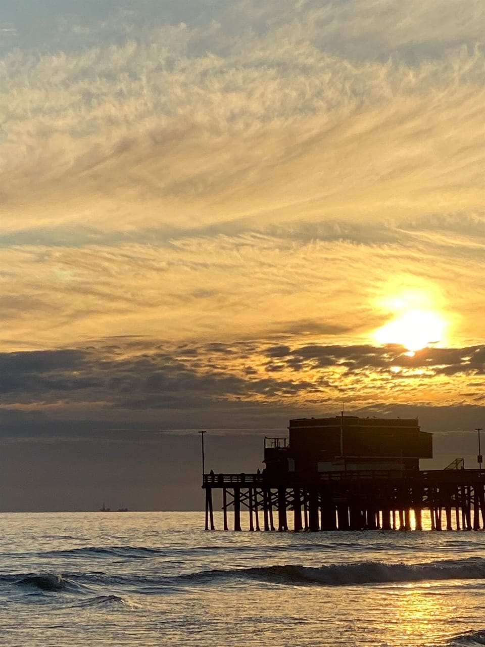 Golden Sunset at Newport Pier – 10 Min from Your Rental.