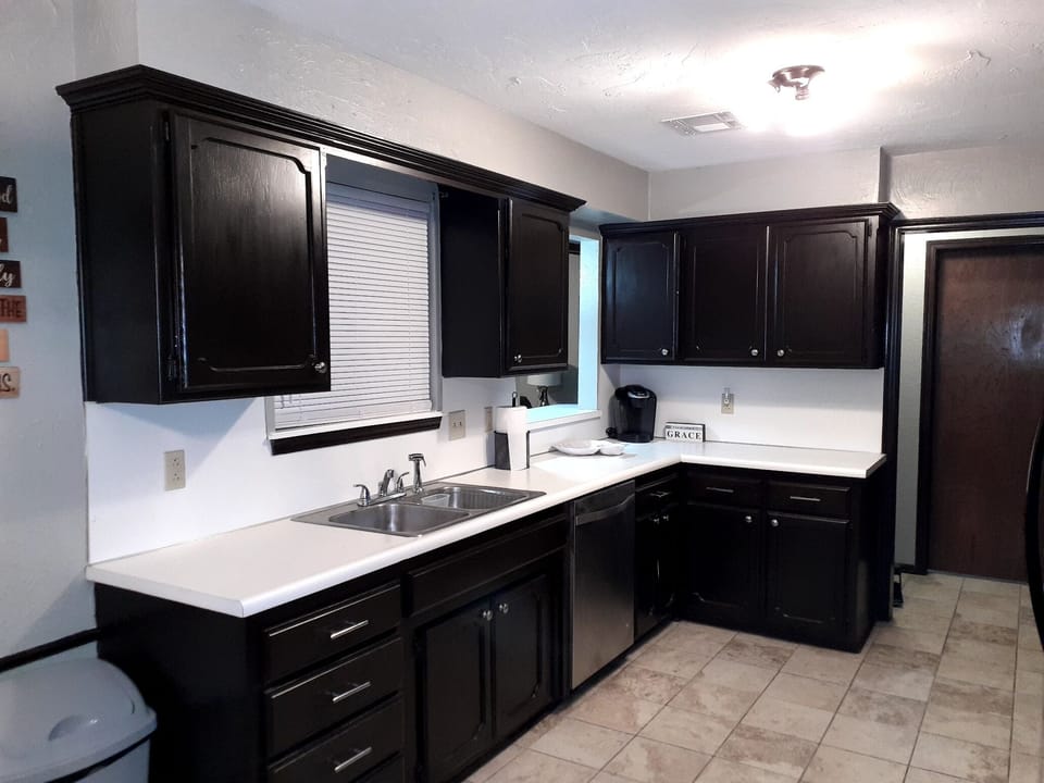 complimentary coffee, oatmeal, grits, and pancake mix in the cabinet