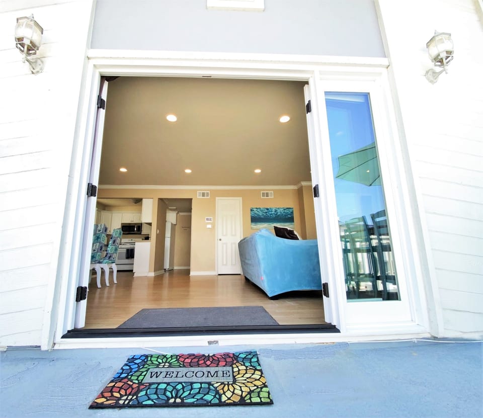 French doors into Your Home by the Sea from Ocean View Balcony!