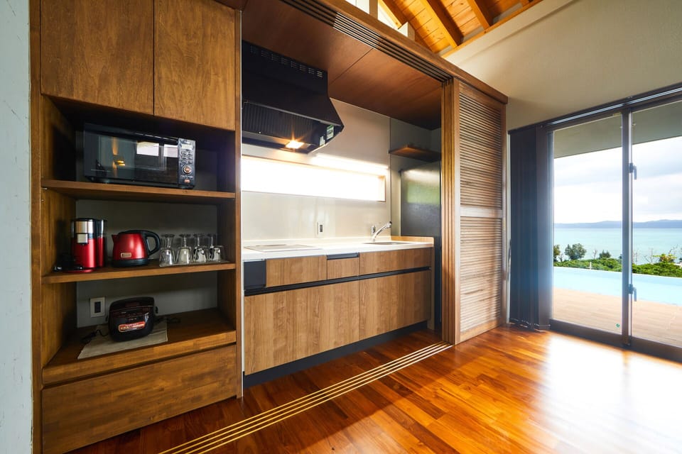 Full-size fridge, microwave, stovetop, rice cooker