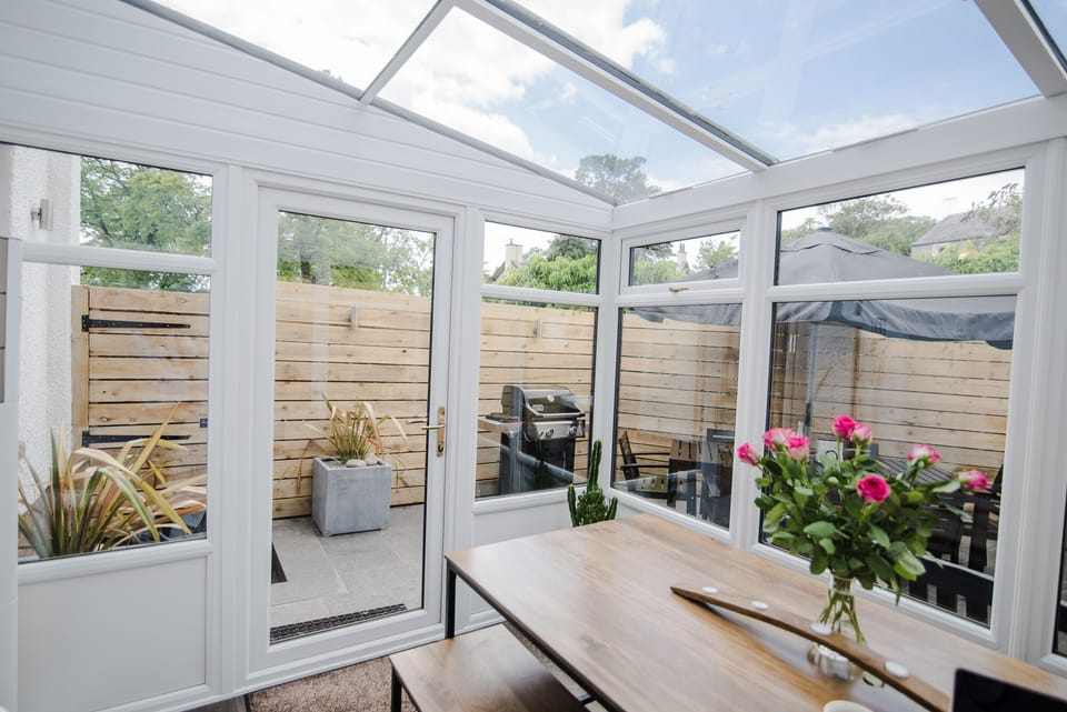 Dining conservatory, fully tiled with under-floor heating