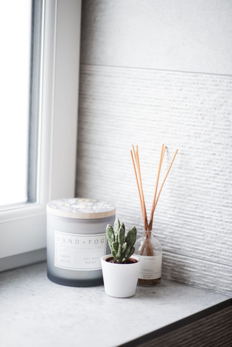 Fully tiled Porcelanosa bathroom suite