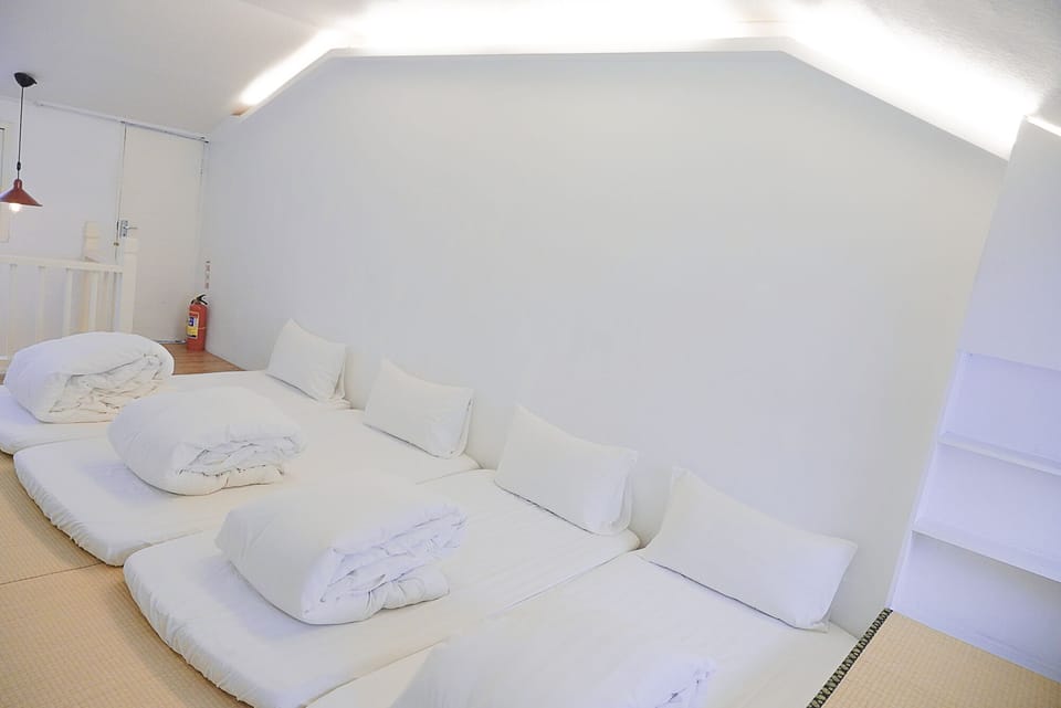 Senior Quadruple Room | Desk, blackout drapes, rollaway beds, free WiFi