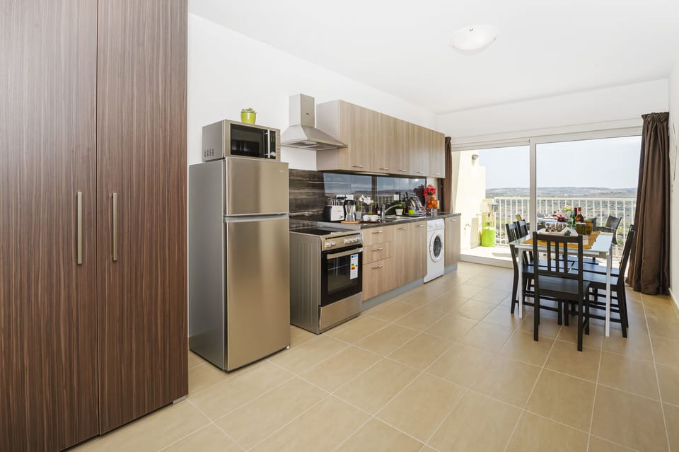 Superior Apartment | Private kitchen | Full-size fridge, microwave, oven, stovetop