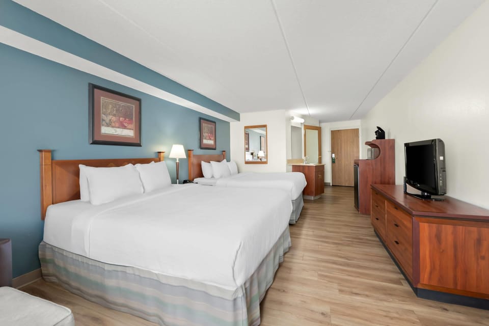 Standard Room, 2 Queen Beds, Non Smoking | In-room safe, laptop workspace, blackout drapes, iron/ironing board