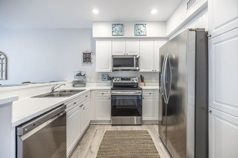 Kitchen with new stainless steel appliances
