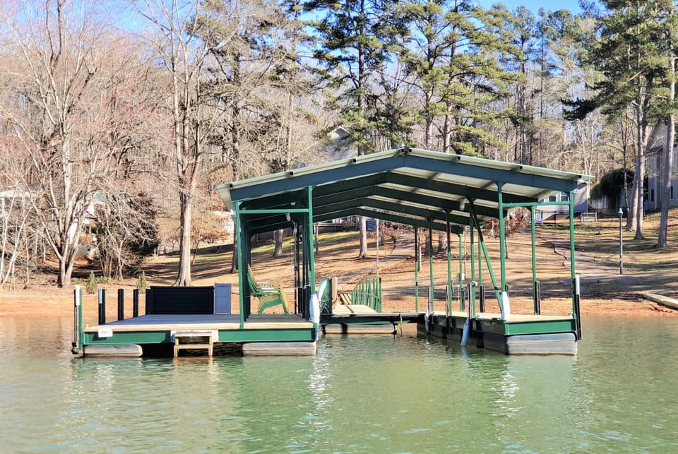 Large covered dock with space for 3 boats to park