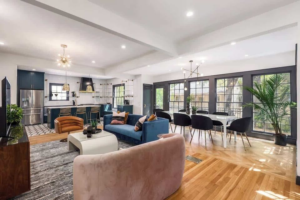 The living, dining and kitchen spaces are open to each other, which is perfect for entertaining