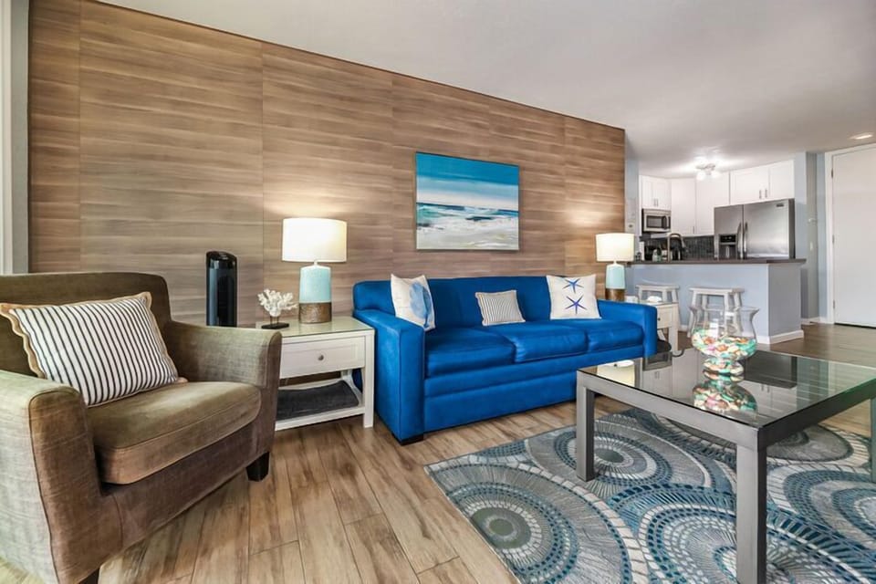 Custom accent wall carrying the beach theme throughout the living area