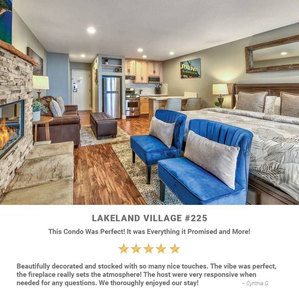 Unwind in your stylish studio with a cozy fireplace, full kitchen, and elegant blue accents creating the perfect mountain retreat.