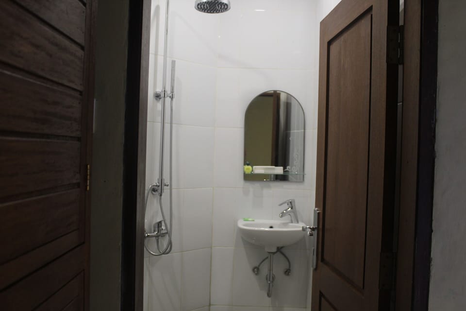 Shower, slippers, towels, soap