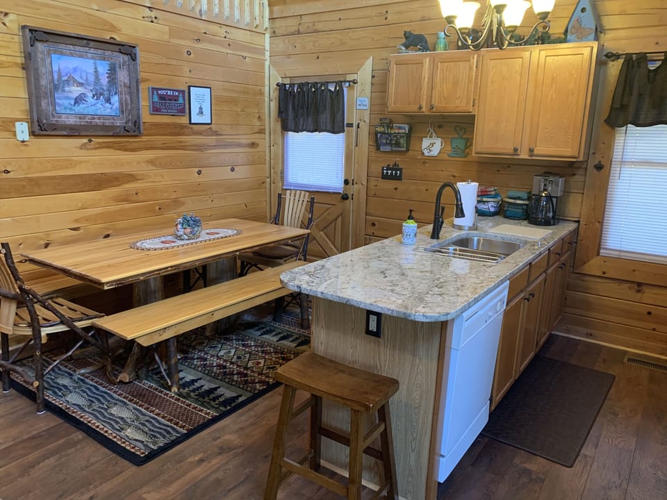 Enjoy the new granite and new flooring! dining seating for 8-10.