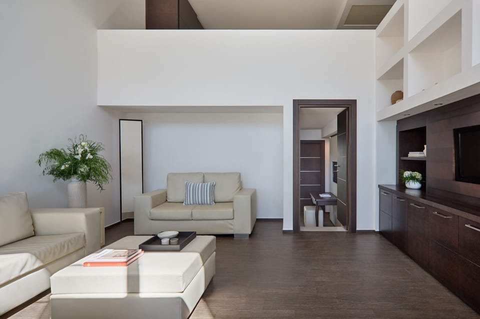 Two-Storey Beachfront Residence | Living area | 37-inch flat-screen TV with satellite channels, TV