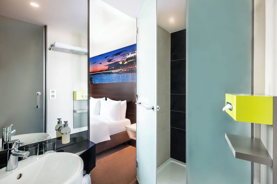 Room, 1 King Bed | Bathroom | Eco-friendly toiletries, hair dryer, towels, soap