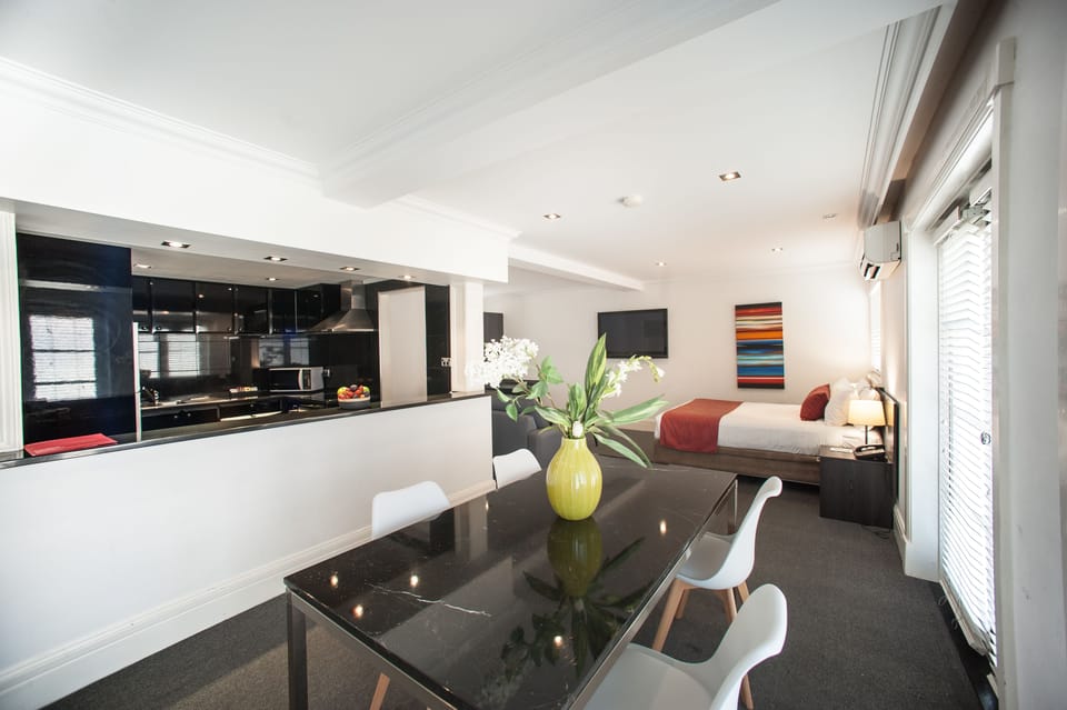 Deluxe Suite with Pool View & Kitchen | Desk, iron/ironing board, free WiFi, bed sheets