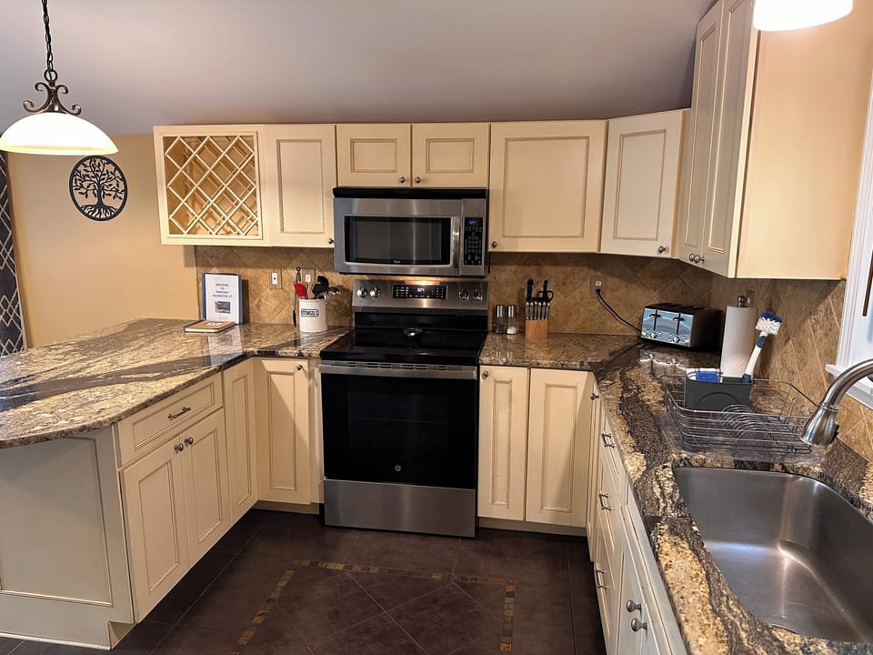 Spacious, well equipped kitchen with mountain views