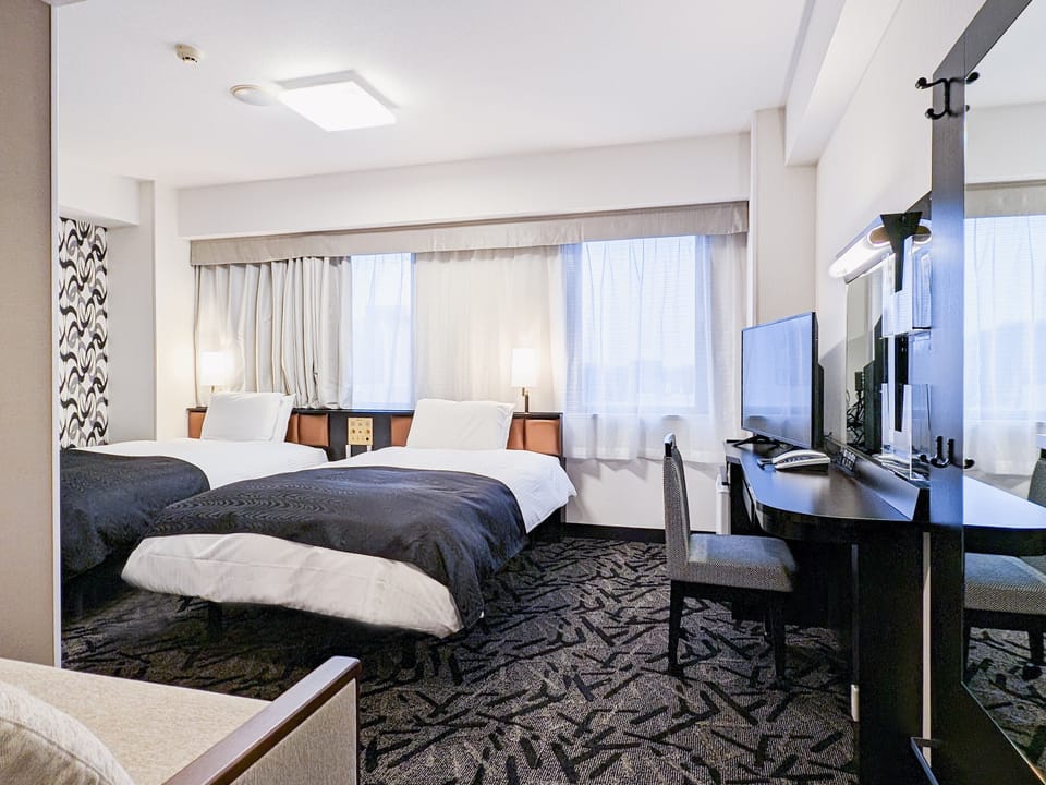 Down comforters, desk, free WiFi, bed sheets