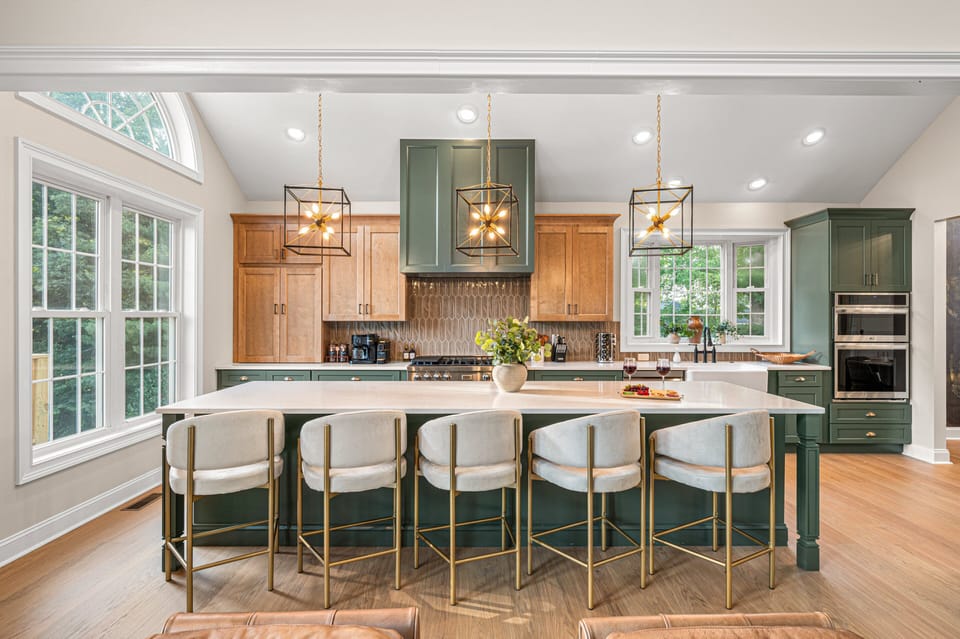[Kitchen] Cook gourmet meals in this stunning kitchen with two-tone cabinetry and island seating.