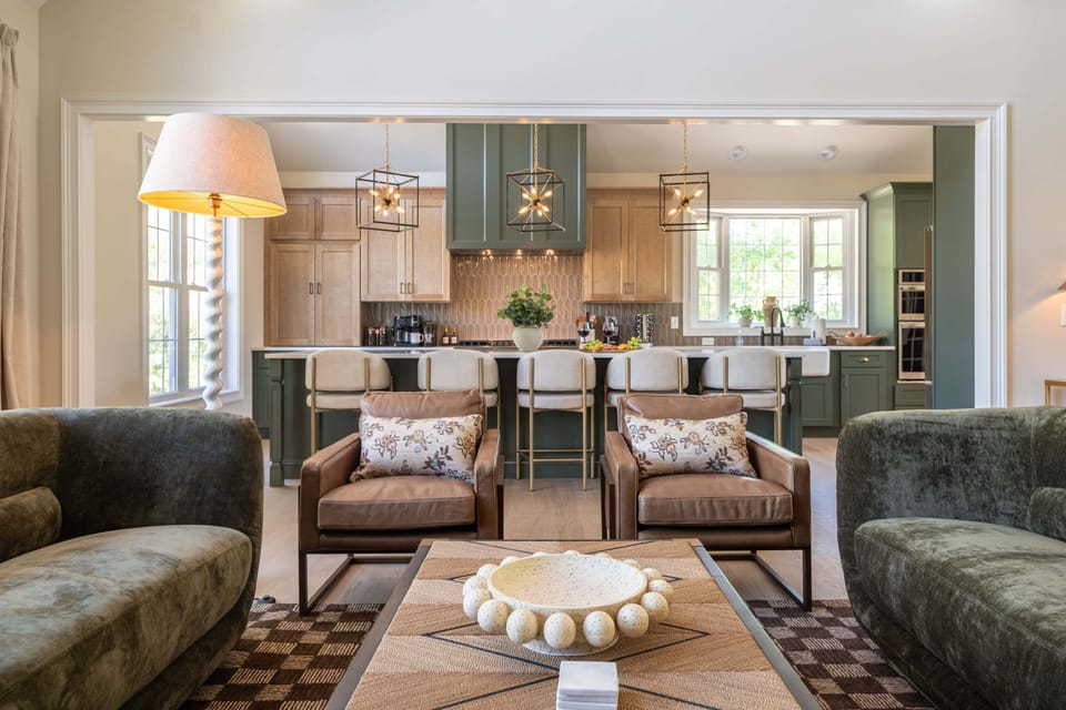 [Main Living Area] Wide pathways create a thoughtful floor plan that flows smoothly from the living area, kitchen, and dining room.