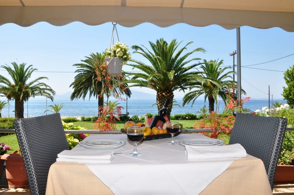 Breakfast, lunch, dinner served; Greek cuisine, beach views 