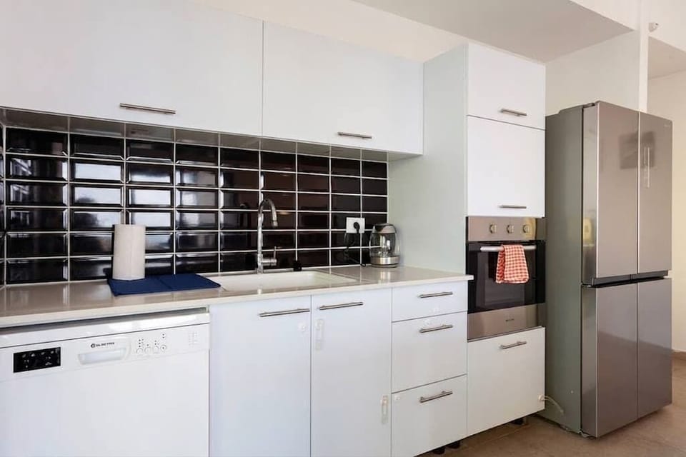 Fully equipped kitchen makes meals easy, with everything needed for a comfortable extended stay.