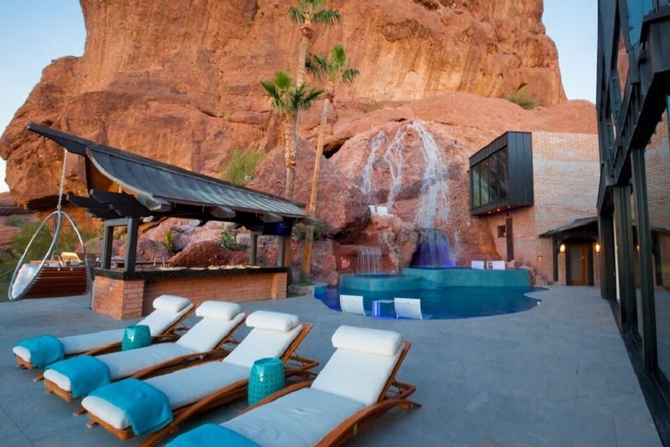 Lounge poolside and enjoy the view (waterfall non-operational when pool heat on)
