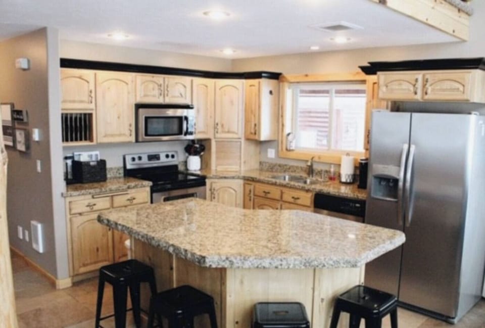 Kitchen is fully stocked with everything you need to make delicious meals.