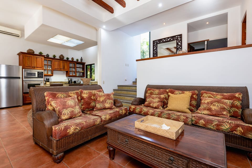 This generously sized space seamlessly transitions as it opens up, leading you onto the expansive veranda.