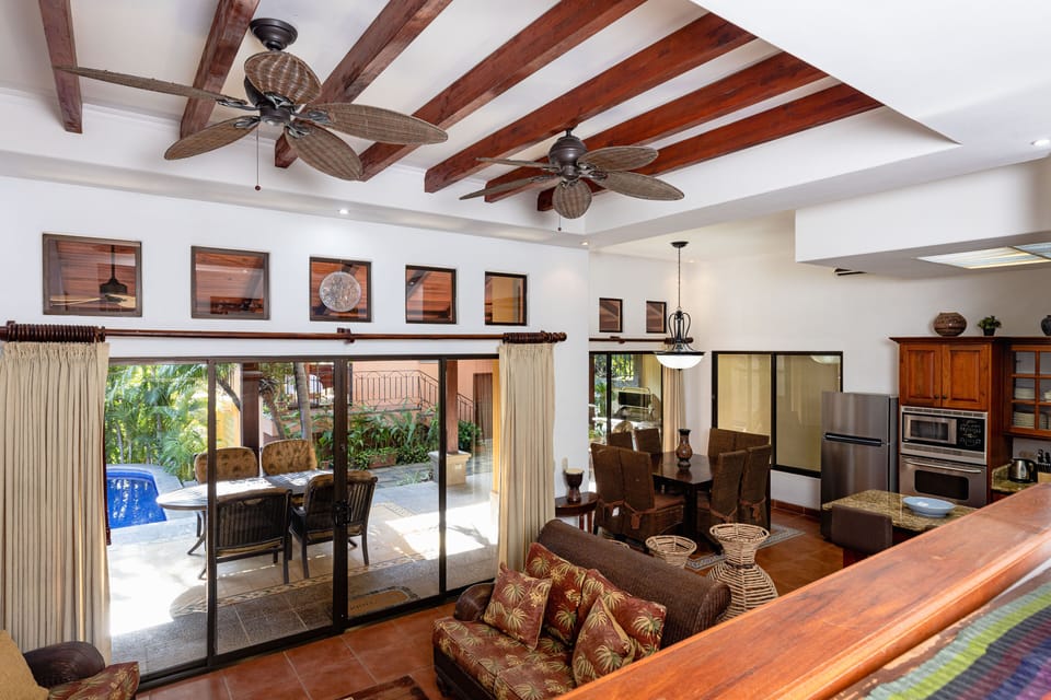 Step into the inviting living and dinning area, where a spacious and comfortable sitting area beckons you to unwind.