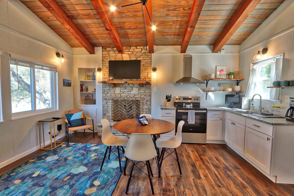 Dining table and view of kitchen.