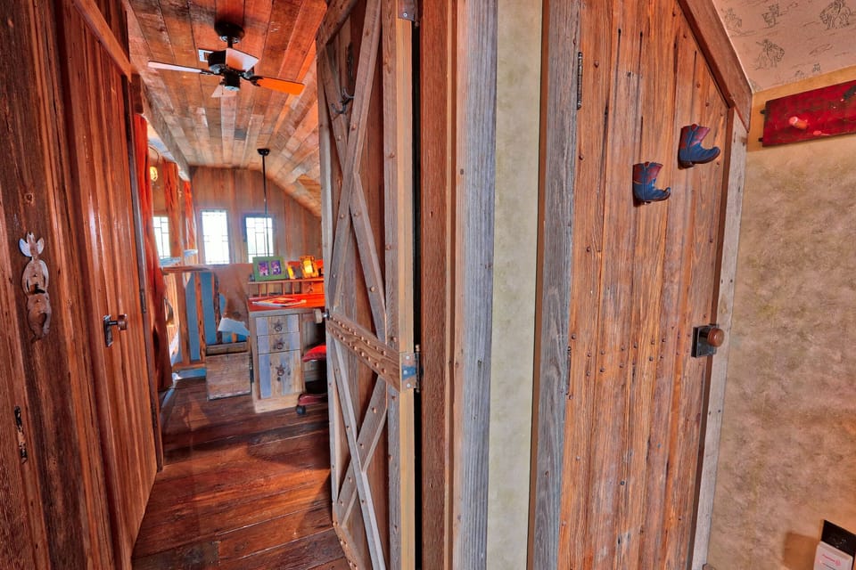 Looking from bedroom two toward the desk and reading area.