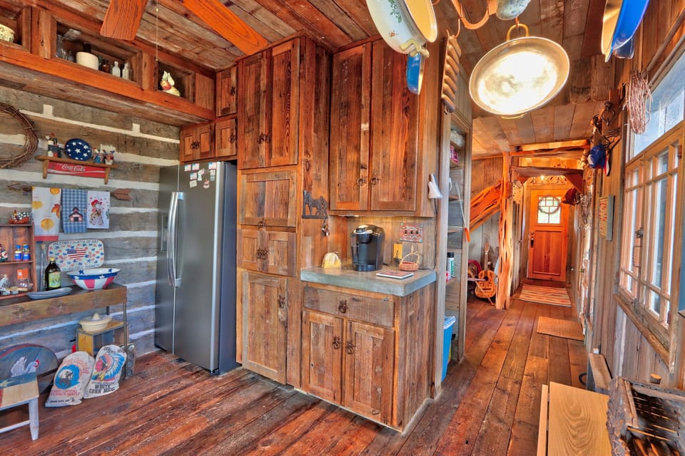 The kitchen is in the rear of the cabin.