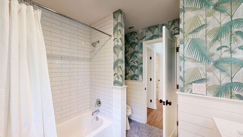 Guest Bathroom with Tiled Tub and Shower Combination