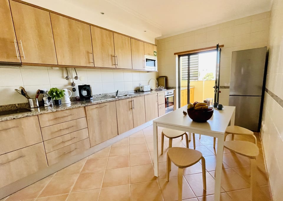Well-equipped dining kitchen with access to the terrace
