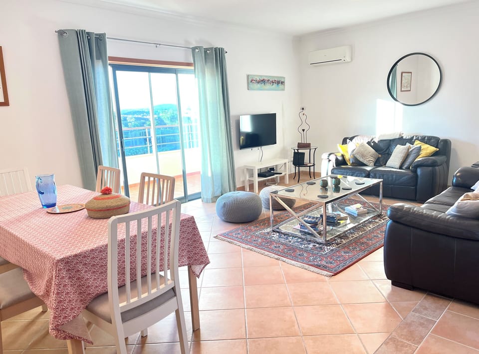 Large bay window giving access to terrace and beautiful view