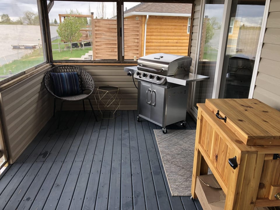 Back deck with BBQ and cooler stand