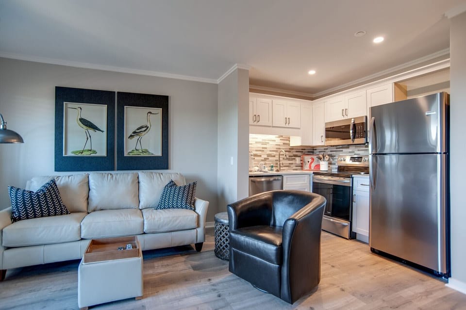 Carolina Beach Club 428 - Living Area - renovated kitchen and living space.  Lovely coastal feel.