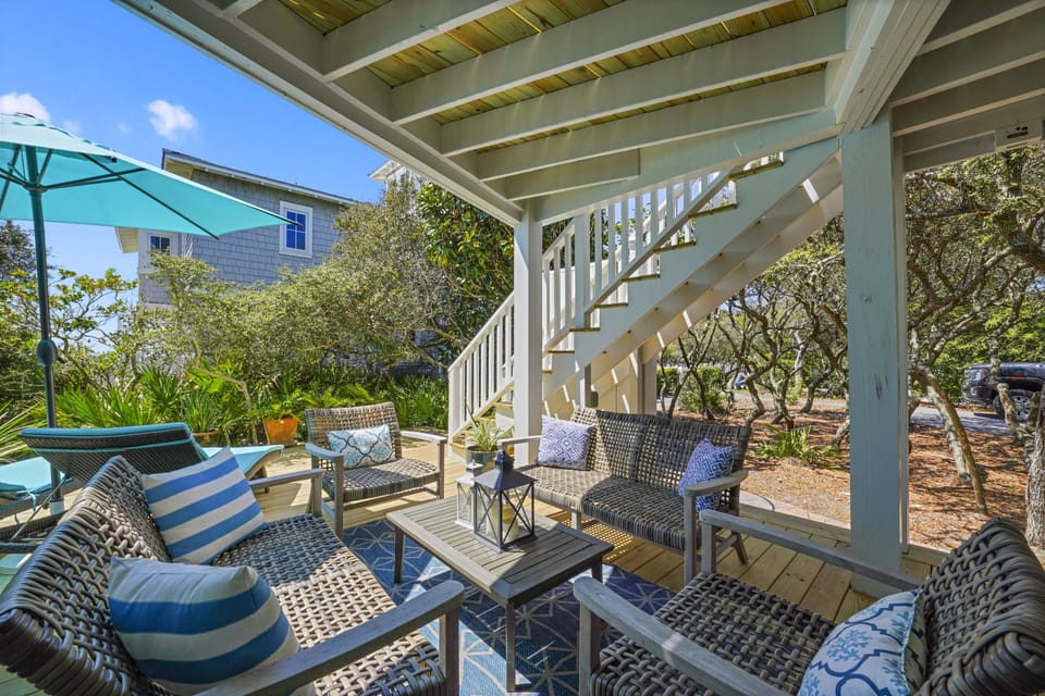 THREE FURNISHED OUTDOOR LIVING AREAS, PORCH W/LOUNGE SEATING