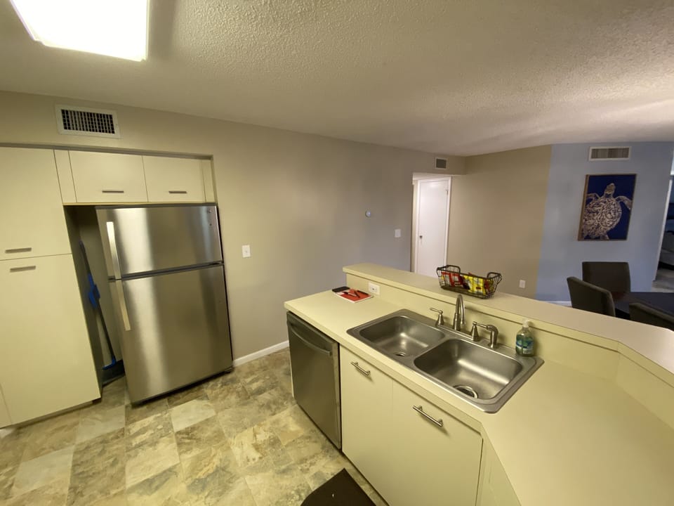 Kitchen w/ garbage disposal.