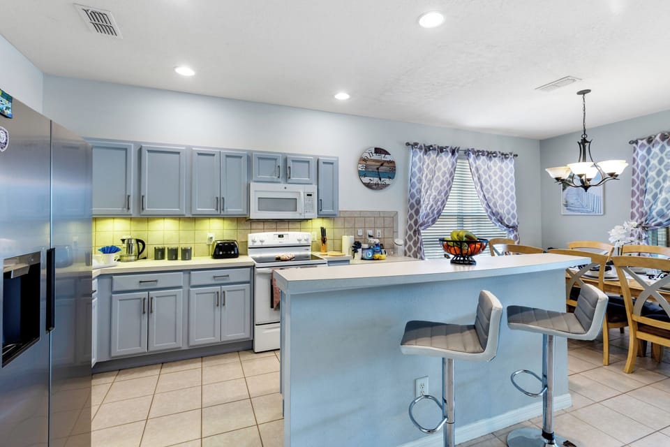 Villa | Private kitchen | Fridge, microwave, oven, stovetop