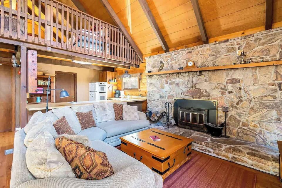 The look of the living room and kitchen from the doorway.
