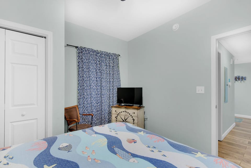 Guest bedroom with flat screen TV