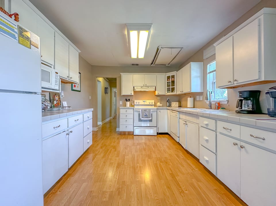 spacious kitchen stocked with everything you need